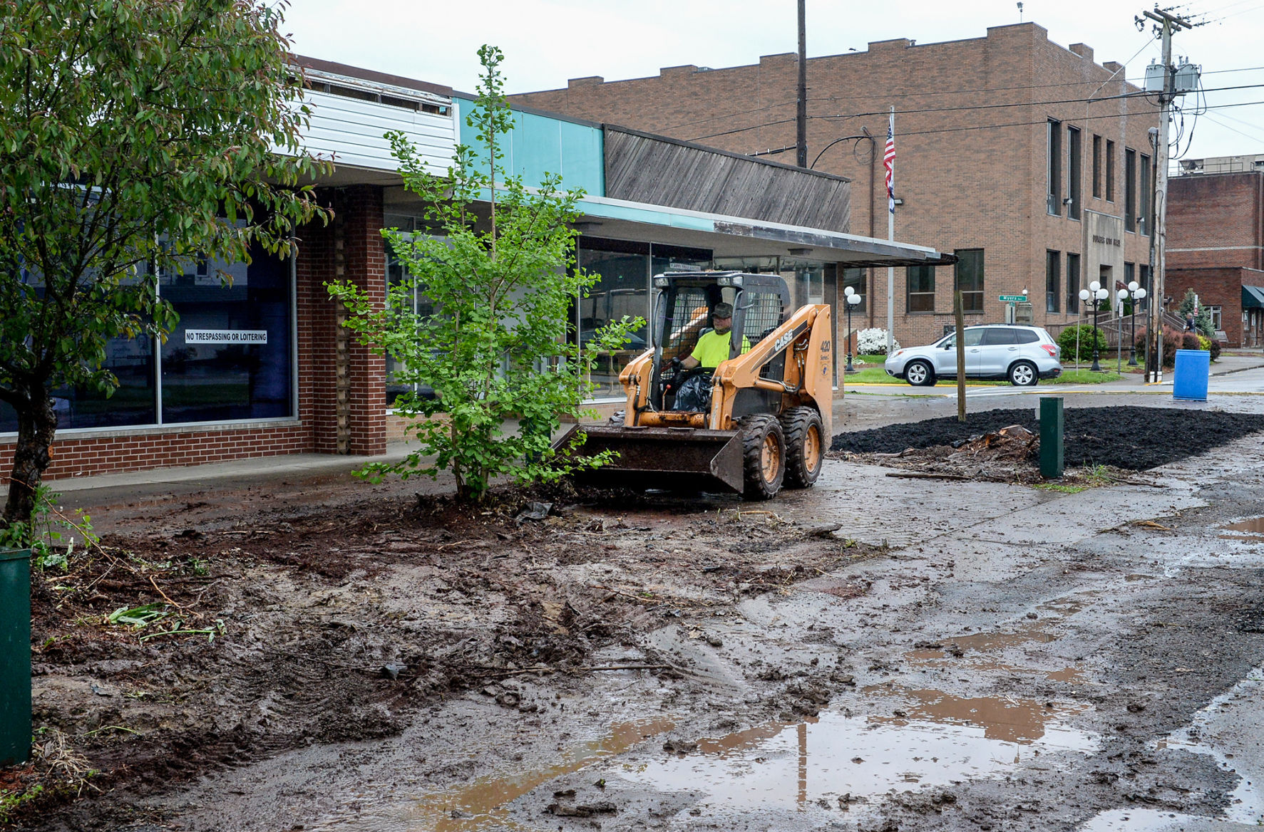 PHOTO: Clearing dirt for flower beds